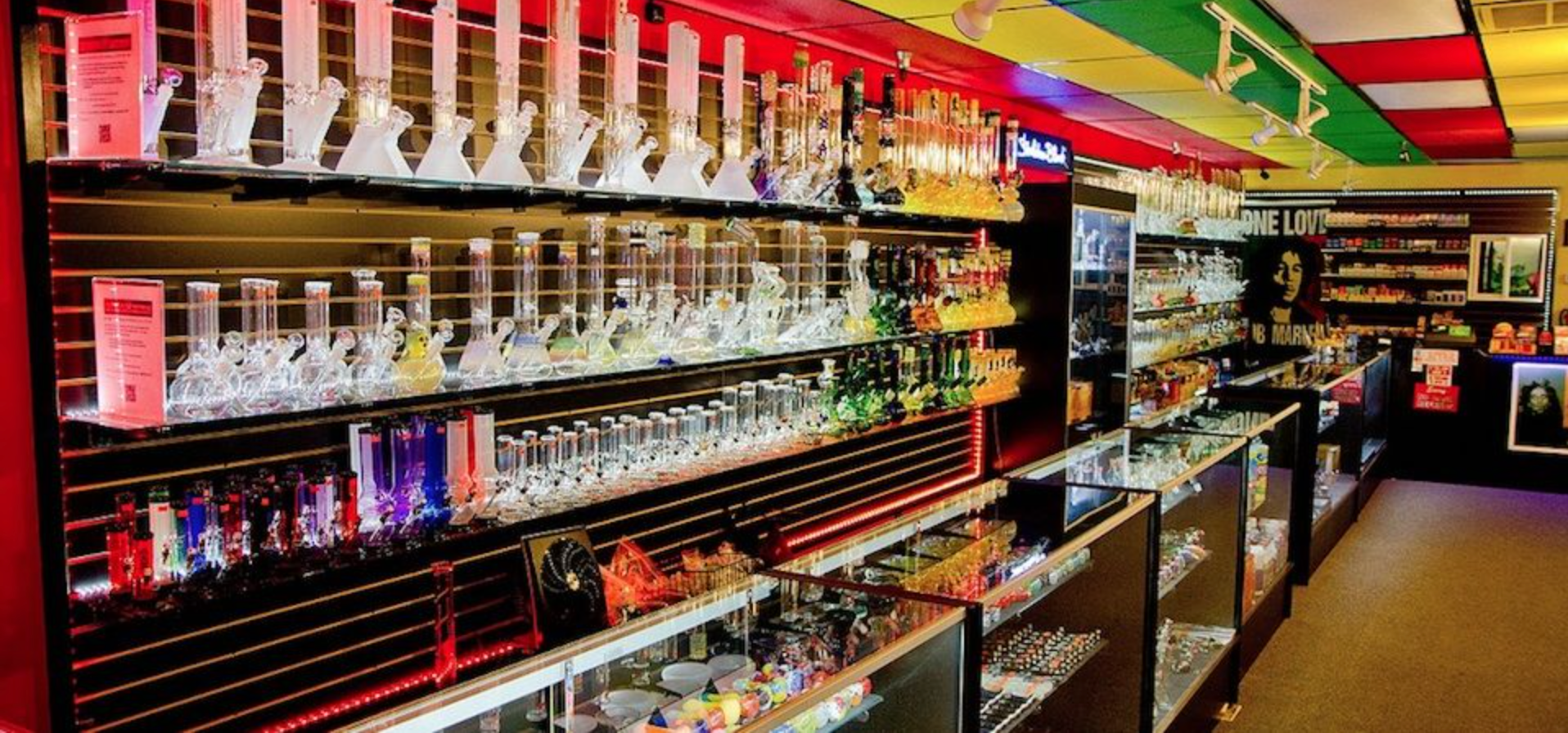 Wholesale Smoke Shop showing a really cool retail location with Bongs and Glass Pipes.  Our unique approach, market share of imports, and ability to blow our own glass, gives us the ability to supply your store with bulk pipes, water pipes, and dab rigs